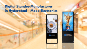 Maxx Electronics digital standee manufacturer showcasing LED display standees in a mall setting